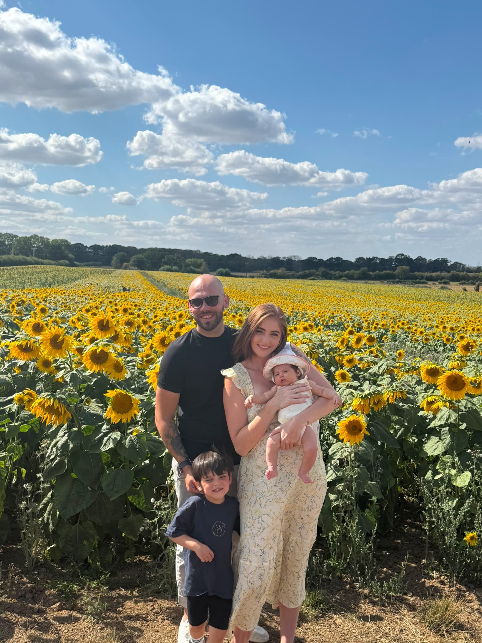 Laura and Sam with their family