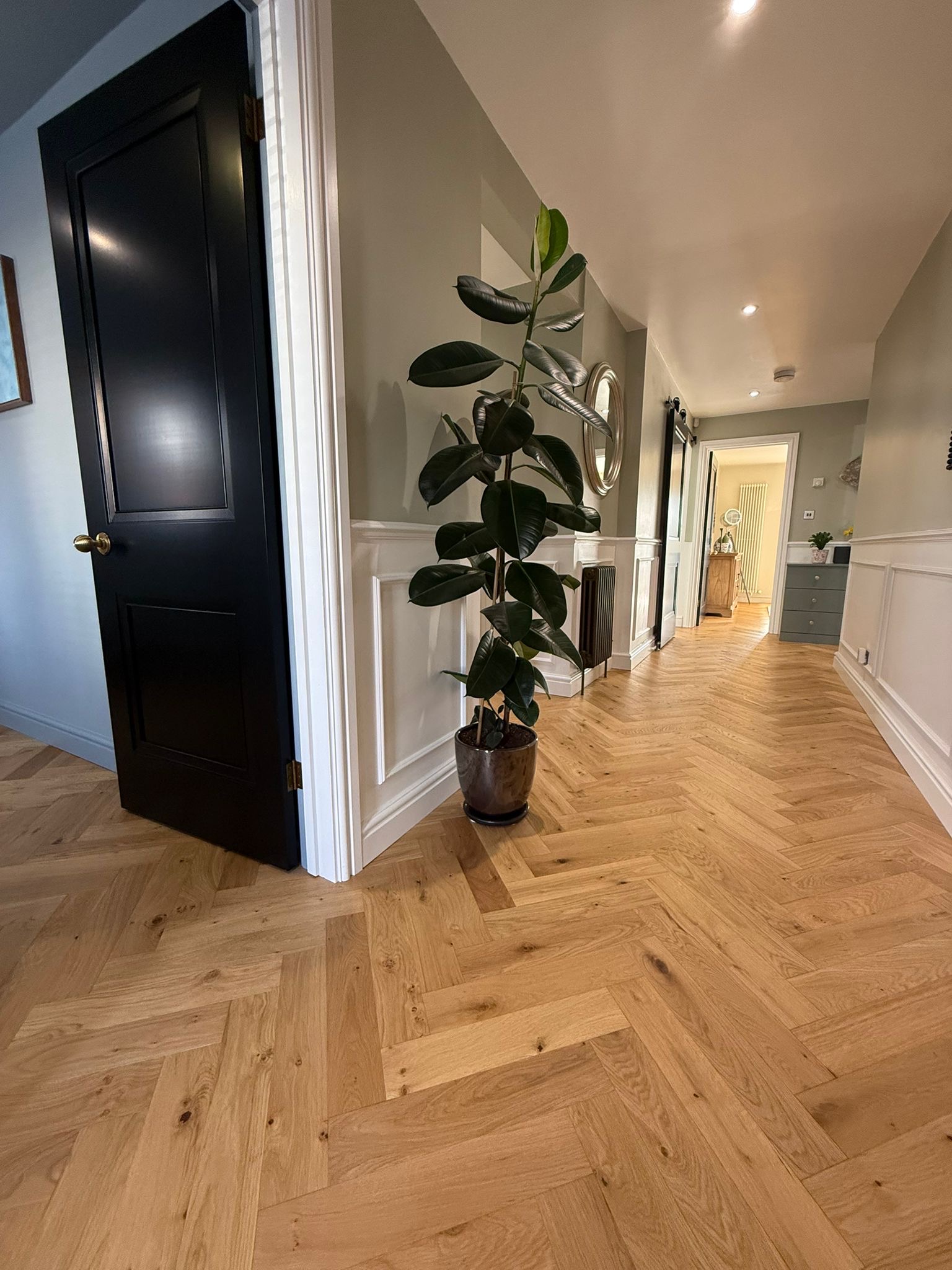 Oak herringbone in a panelled Oxford hallway