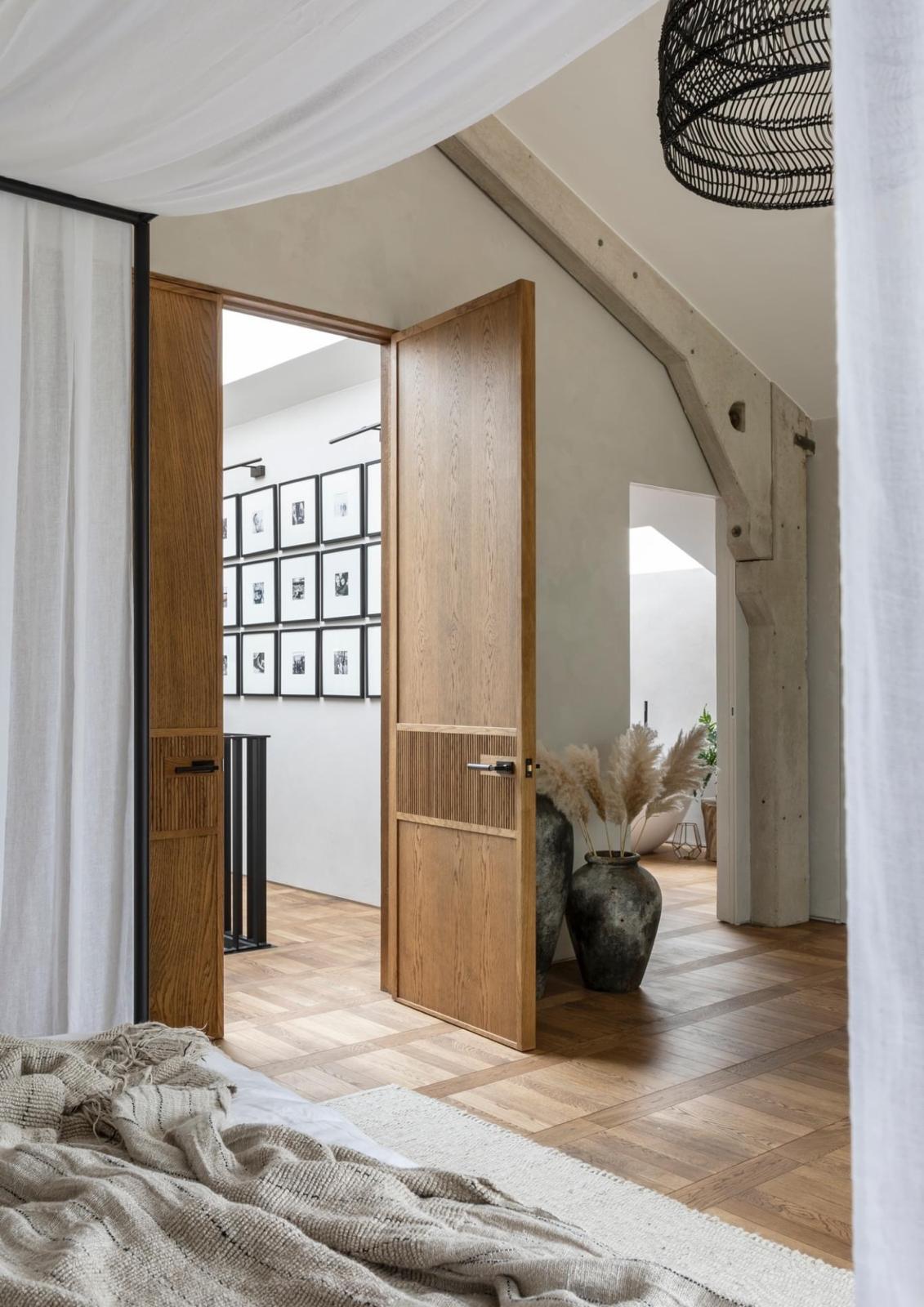 Oak doors and a precisely finished floor running from room to room