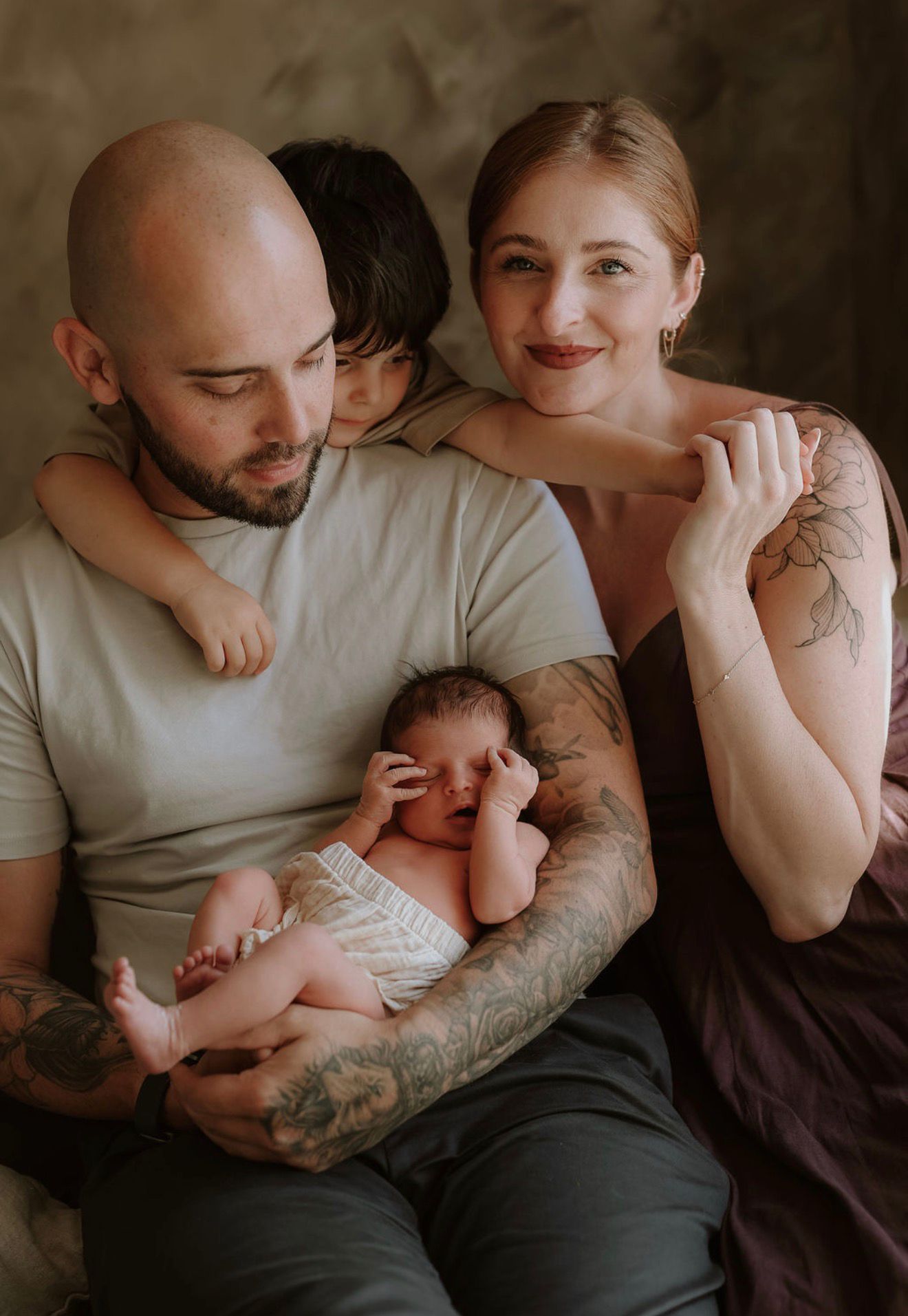 Sam and Laura with their children